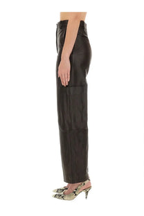 Khaite women’s black leather high waist trousers with patch pockets in the caiton brown collection