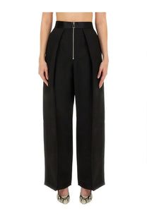 Khaite women’s black high-waisted wide-leg trousers with front zipper detail in marine fabric