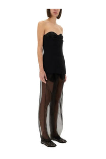 Khaite women’s black pants with sheer overlay and a strapless black bodice dress detail