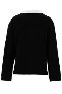 Khaite women’s polo Faithful black long-sleeved top with contrasting white collar in soft fabric for casual wear