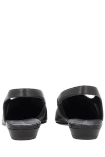 Black leather mules with low block heel and open back design by khaite women’s shoe celia black