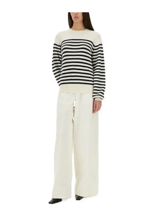 A cozy cream and black striped knit sweater with long sleeves from khaite women’s violet shirt multicolor collection