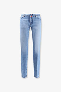 Kiton men’s blue denim jeans in light-wash with straight-leg cut subtle fading and an orange button waistband