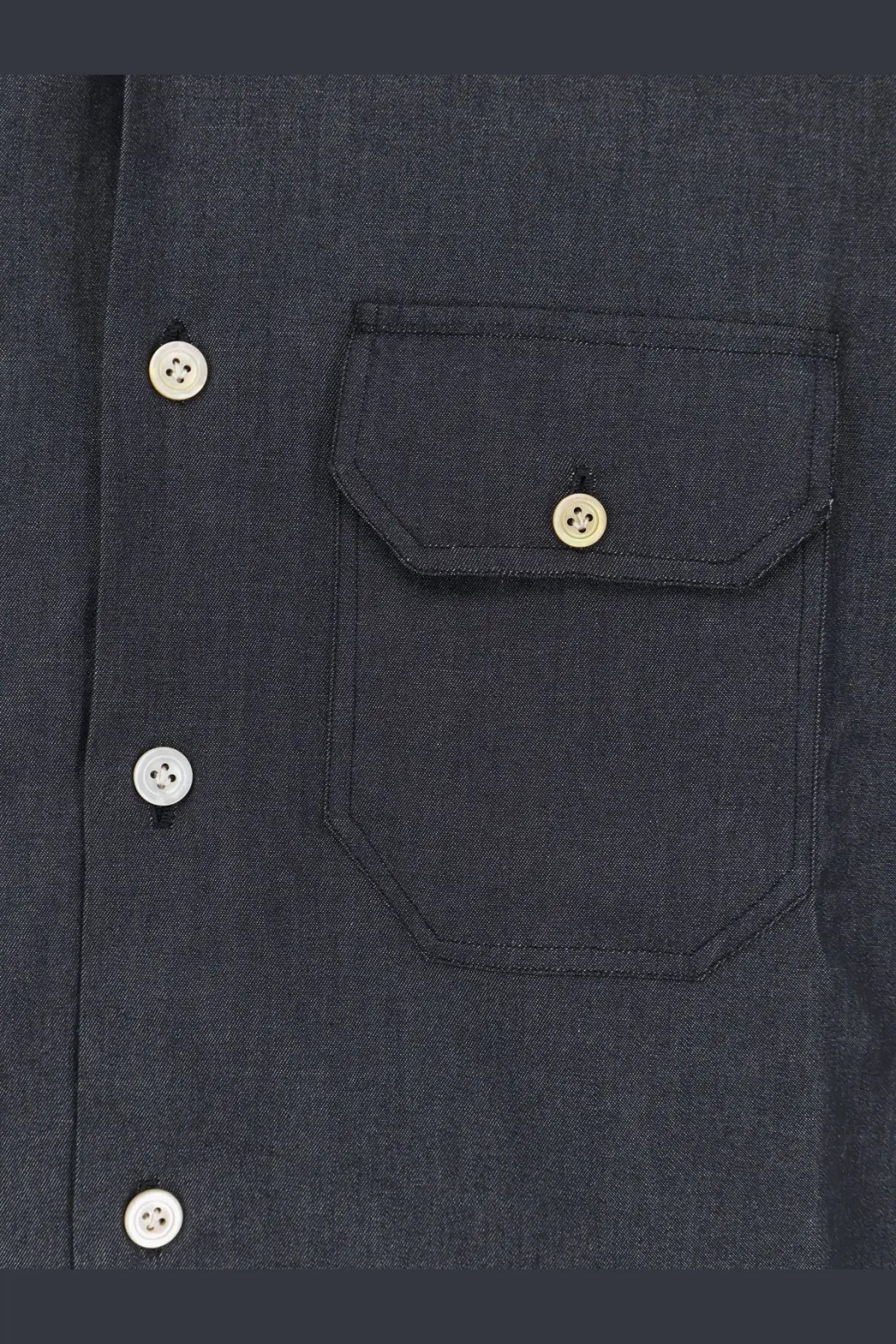 Kiton men’s cotton shirt in black featuring a dark blue denim fabric chest pocket and matching buttons