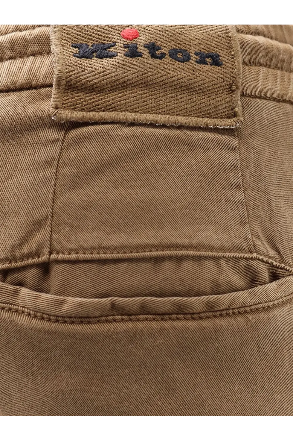 Kiton men’s beige lyocell trousers with brown denim fabric and a woven ziton label embroidered with dark thread and red dot