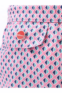 Kiton men’s nylon swim trunks in pink with navy blue and light teal geometric triangles and a red button logo