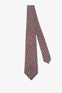 Kiton men’s silk tie in burgundy with a subtle white geometric pattern for formal and business wear