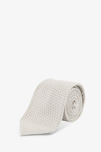 A light gray woven silk tie with a textured basketweave pattern from kiton men’s multicolor collection