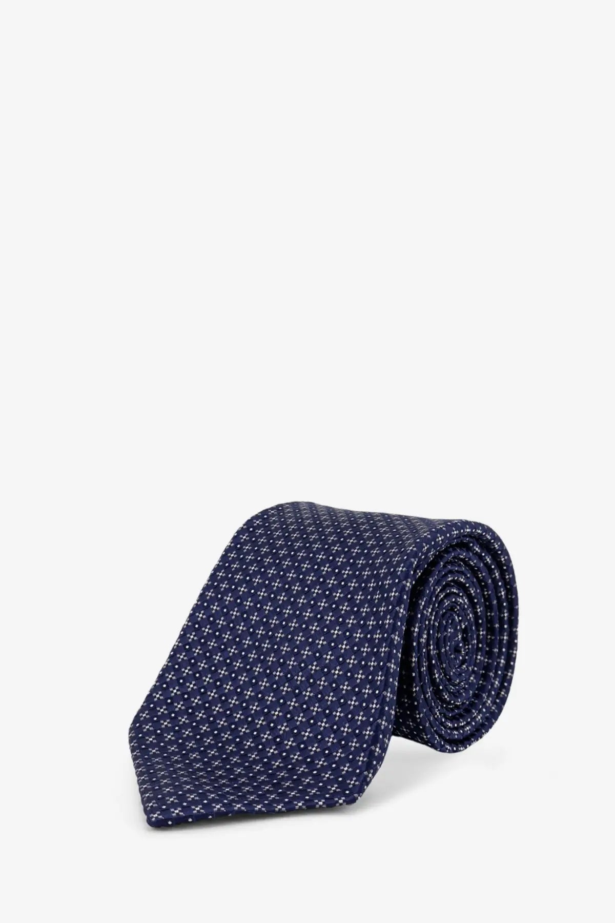 Kiton men’s silk tie in navy blue with a subtle pattern of small white crosses