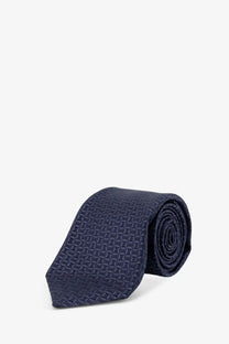 Kiton men’s silk tie multicolor in navy blue with a subtle geometric pattern and smooth silk texture