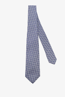 Kiton men’s silk tie in navy blue with a subtle white geometric pattern perfect for formal occasions