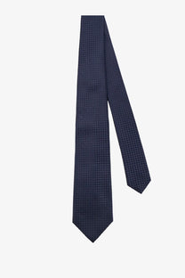 A navy blue Kiton men’s silk tie with a subtle textured pattern for formal and professional wear