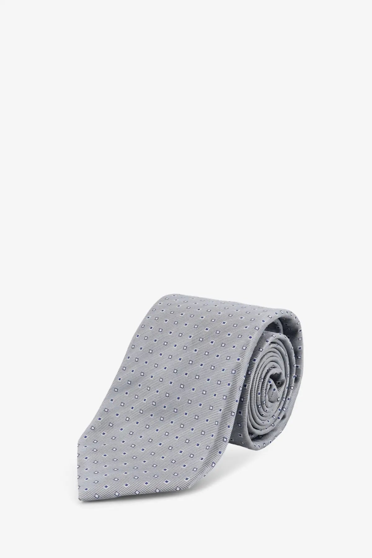 A neatly rolled kiton men’s silk tie in light gray with a subtle dark gray square pattern
