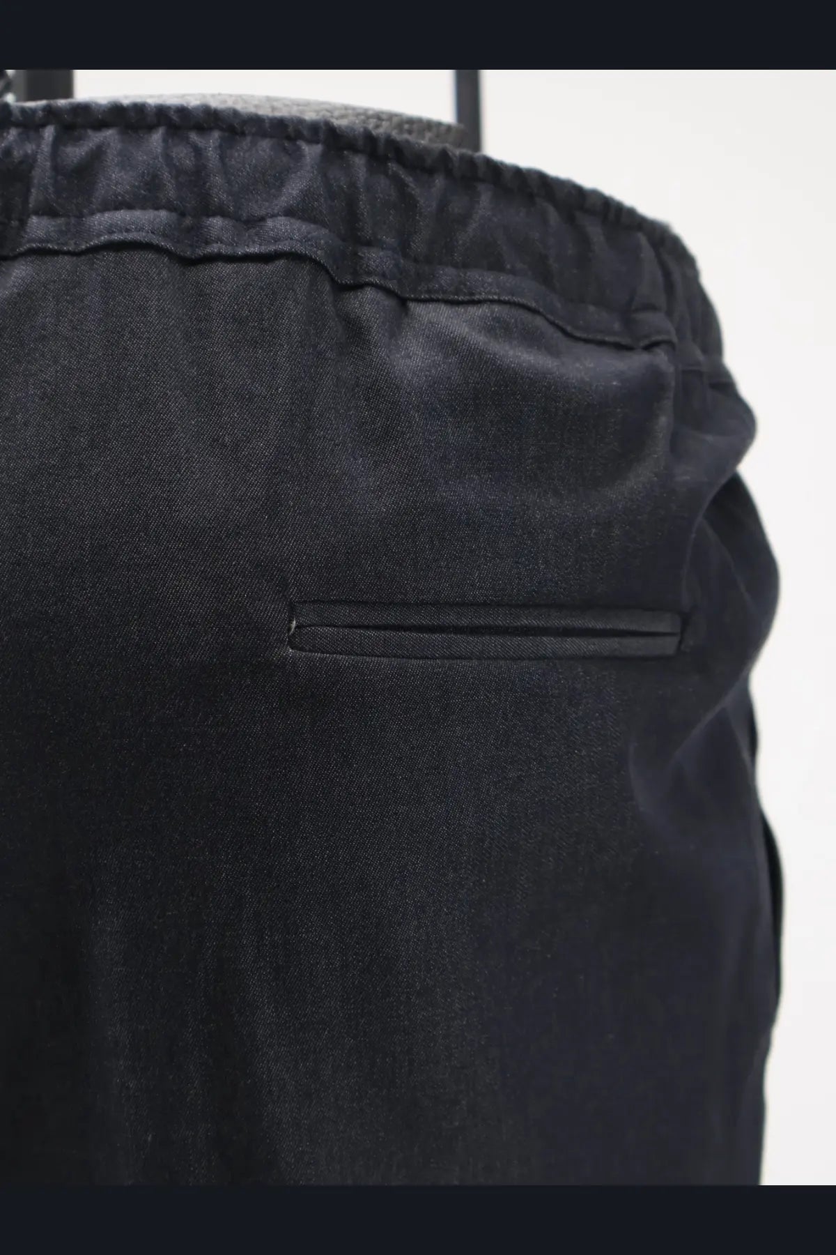 Kiton men’s black stretch cotton trousers with satin-like fabric drawstring waistband and subtle front pocket