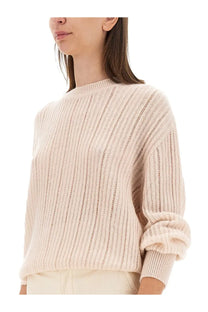 Kiton women’s beige cashmere sweater with a soft cream-colored ribbed knit relaxed fit and rolled-up cuffs