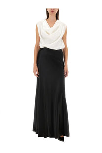 Kiton women’s shirt white paired with a sleek black satin maxi skirt featuring a smooth flowing drape and high waistline