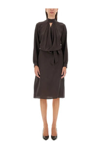 Kiton women’s silk dress brown featuring a sleek dark gray silk blouse with high neckline and matching tie belt