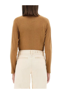 Kiton women’s camel-colored long-sleeve knit turtleneck shirt with high neckline and ribbed cuffs in beige