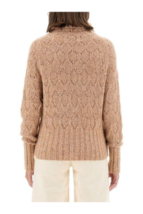 Kiton women’s brown turtleneck shirt showing the back with a cozy beige knitted sweater and diamond pattern design
