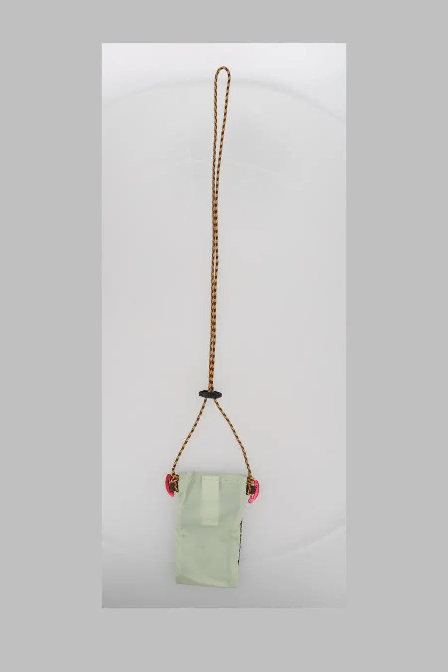 Klättermusen women’s borsa algir smartphone pouch in delicate mint green fabric with braided brown cord and pink clasps