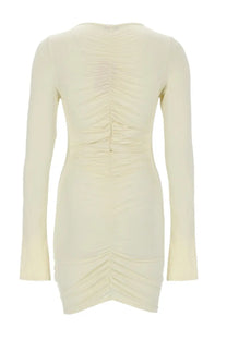 Cream-colored long-sleeved dress with ruched back design by la reveche visible from the back side