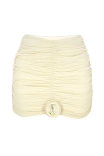 La reveche women’s gonna lillibet white cream-colored ruched mini skirt with matching fabric rose accent at the front