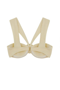La Reveche women’s Sahar white bikini top cream color with wide crossed shoulder straps and gold tone clasp