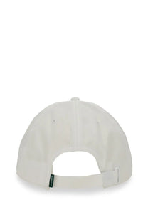 Off-white lacoste men’s baseball hat showing the back with subtle textured fabric and small green brand tag