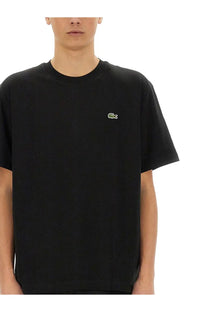 Lacoste men’s black cotton short-sleeved t-shirt with small embroidered crocodile logo on the left chest