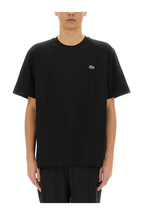 Lacoste men’s black cotton t-shirt with small embroidered green crocodile logo on the left chest