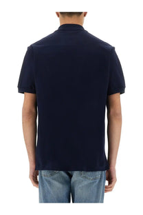 Navy blue Lacoste men’s short-sleeved polo shirt made of breathable cotton for casual and semi-formal wear