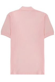 Lacoste men’s polo blue featuring a soft pink cotton fabric with classic collar and short sleeves