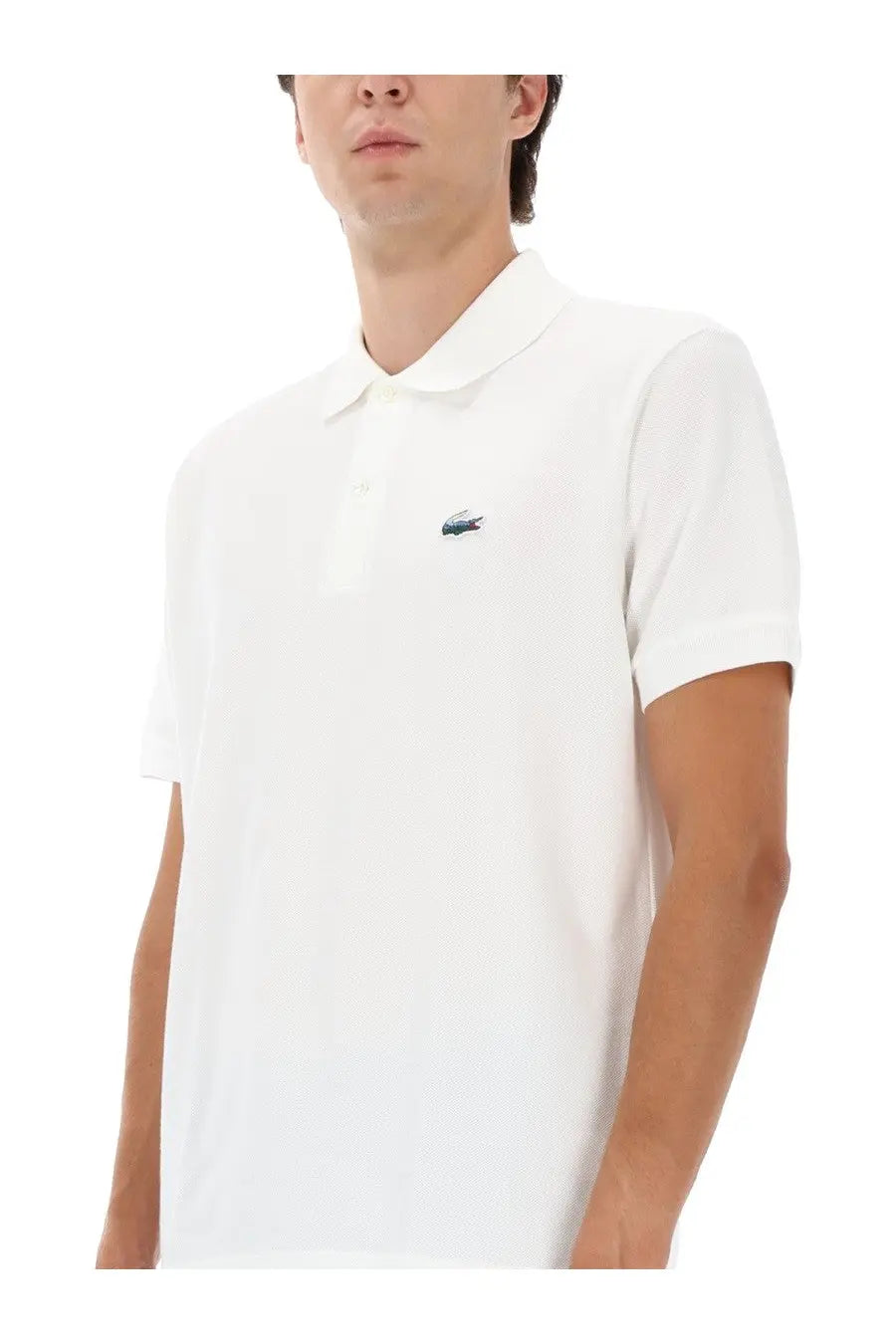 White Lacoste men’s polo shirt in cotton with a small green crocodile logo on the left chest