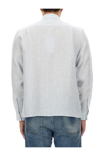 Lacoste men’s light blue and white striped long-sleeved button-up shirt with classic collar for casual wear