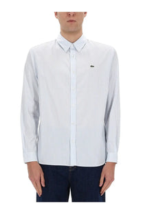 Lacoste men’s white crisp long sleeve pinstripe shirt with classic collar and green crocodile logo on chest