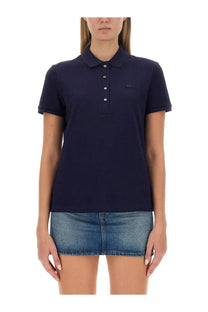 Lacoste women’s navy blue polo shirt with white buttons and small embroidered logo on the left chest