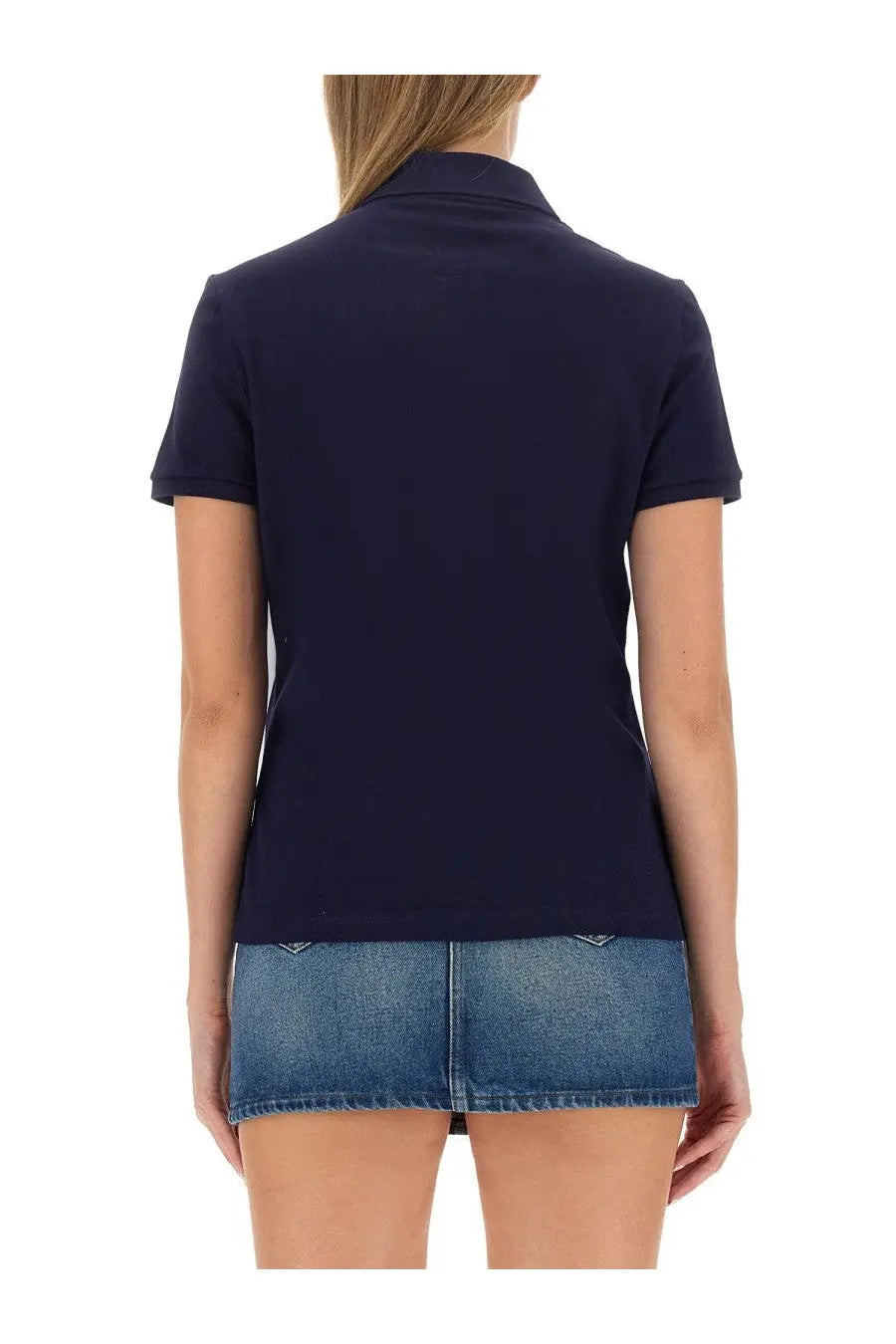 Navy blue lacoste women’s polo shirt with short sleeves classic collar and subtle ribbed texture
