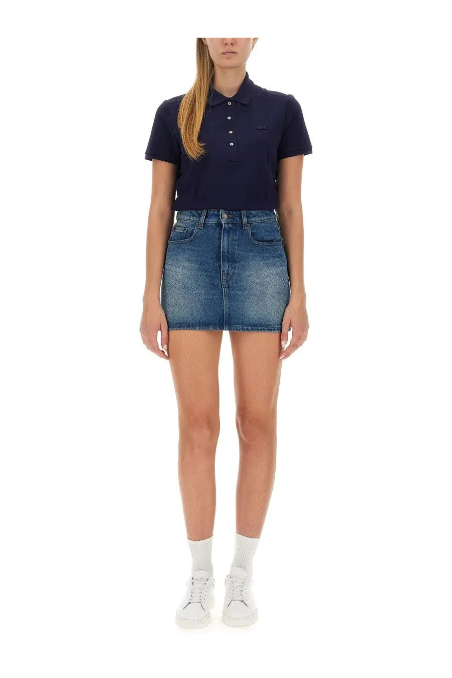 Lacoste women’s navy blue short-sleeved polo shirt with white buttons and embroidered logo on left chest
