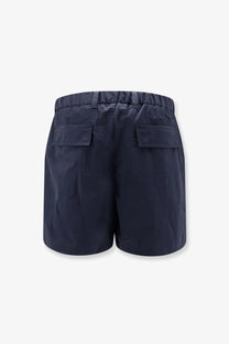 Back side of laminar men’s nylon bermuda shorts in navy blue with elastic waistband and two back pockets