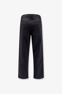 Black laminar men’s straight-leg technical fabric trousers with sleek minimalist design