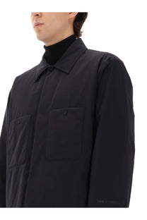 Laminar men’s two layer goretex black utility jacket with structured collar and two front patch pockets