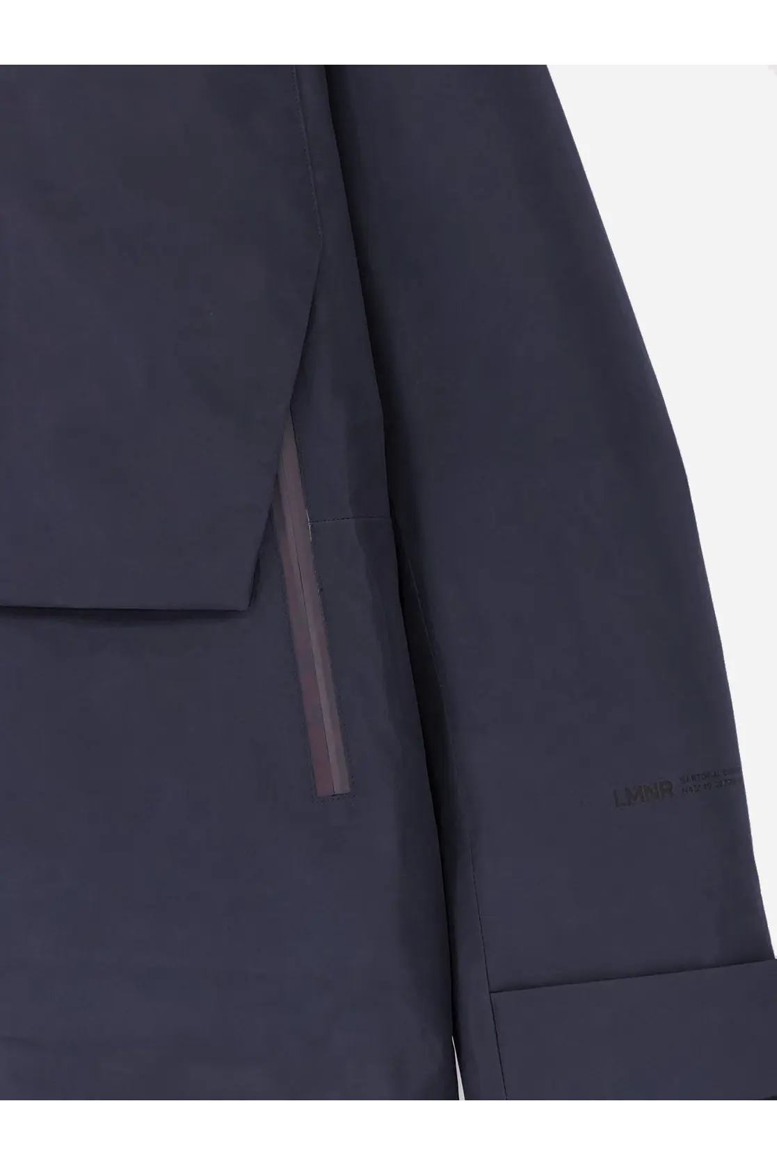 Laminar men’s waterproof jacket black in dark gray technical fabric with tonal zipper pull and minimalist sleeve branding