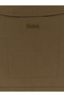 Tan linen backpack with subtle embroidered brand logo shown with laminar men’s wool blend shirt green