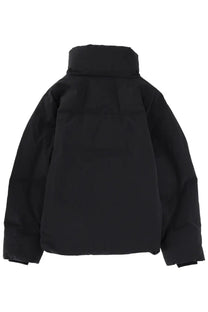 Black laminar women’s crinkle metallic puffer jacket with high collar and quilted design in metallic fabric