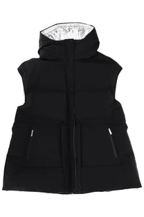 Black laminar women’s crinkle metallic puffer vest with silver-lined hood and two front zippered pockets