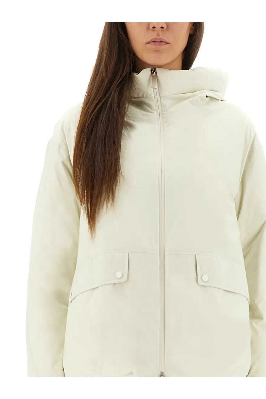Laminar women’s Goretex cream-colored puffer jacket with hood front zipper and flap pockets with white buttons