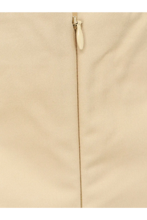 Cream-colored woven fabric with matching zipper pull on the back of lamrons women’s cotton and silk blend yellow top