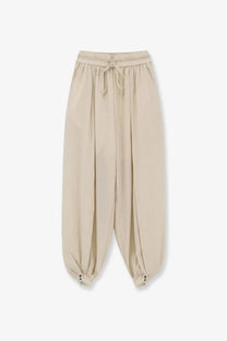 Beige lamrons women’s cotton trousers with elastic waistband and relaxed flowing silhouette for casual wear