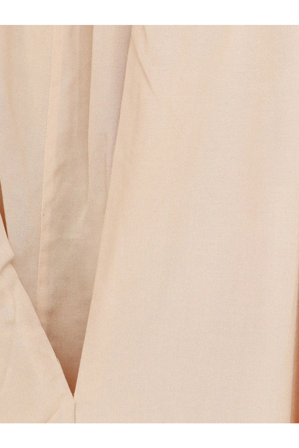 Cream-colored lightweight lamrons women’s modal and silk blend dress beige fabric with soft folds and subtle texture