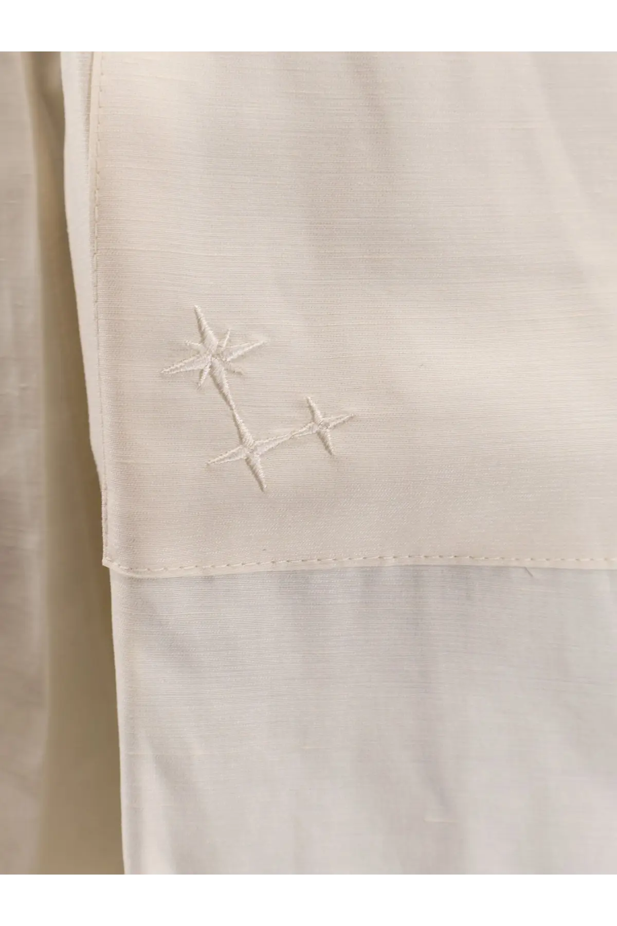 Laneus men’s white viscose and linen bermuda shorts with delicate cream fabric and subtle star embroidery